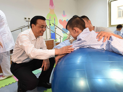 這三年，總理牽掛的殘疾人群體，迎來哪些暖政？