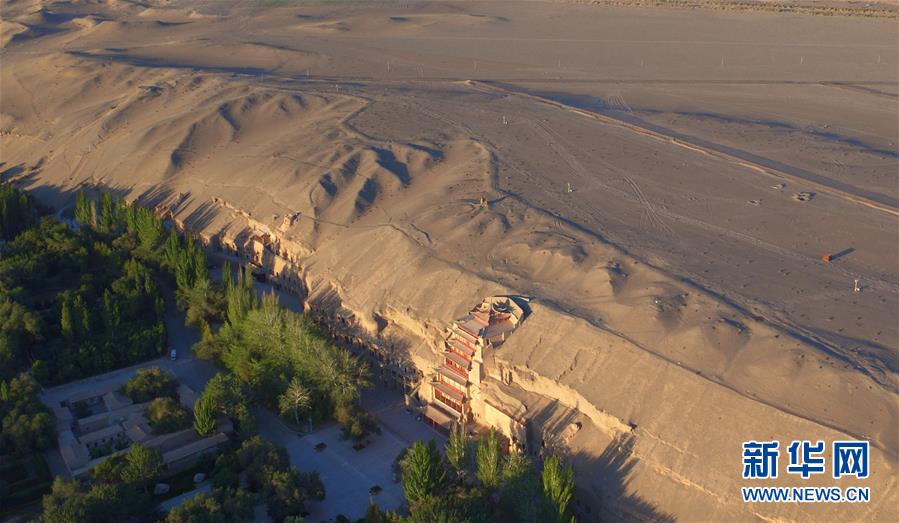 （時代先鋒&middot;圖文互動）（12）此生不悔入沙海 勇?lián)厝问家娊?mdash;&mdash;敦煌研究院文物保護利用群體群像