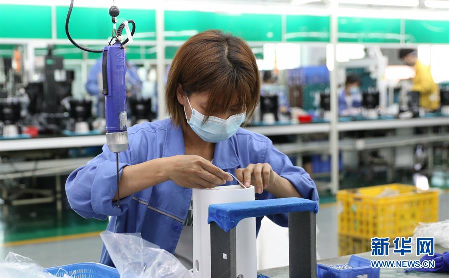 (抓好經濟發(fā)展 應對復雜局面·圖文互動)(1)在“家電之都”順德看“中國制造”抗壓前行