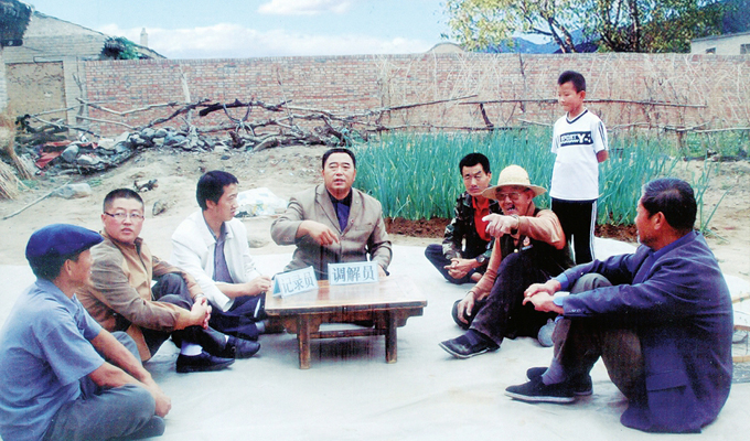 調(diào)解&ldquo;家長(zhǎng)里短，雞毛蒜皮&rdquo;的小事情是李培斌從事的大事業(yè)