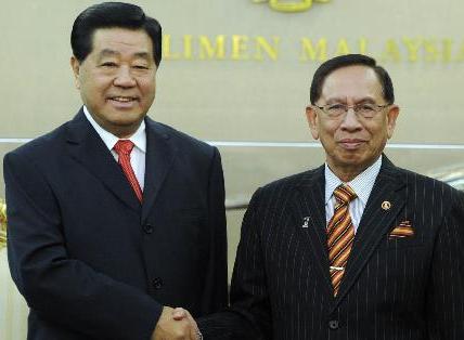 賈慶林會(huì)見馬來西亞上議院議長