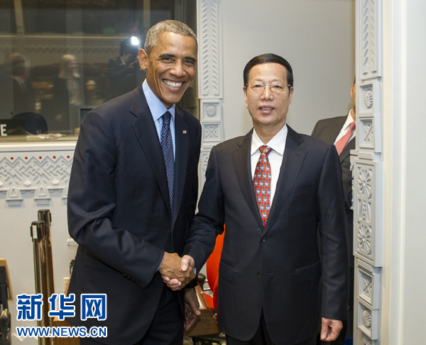 9月23日，國(guó)家主席習(xí)近平特使、國(guó)務(wù)院副總理張高麗在紐約會(huì)見(jiàn)出席聯(lián)合國(guó)氣候峰會(huì)的美國(guó)總統(tǒng)奧巴馬。 新華社記者王曄攝