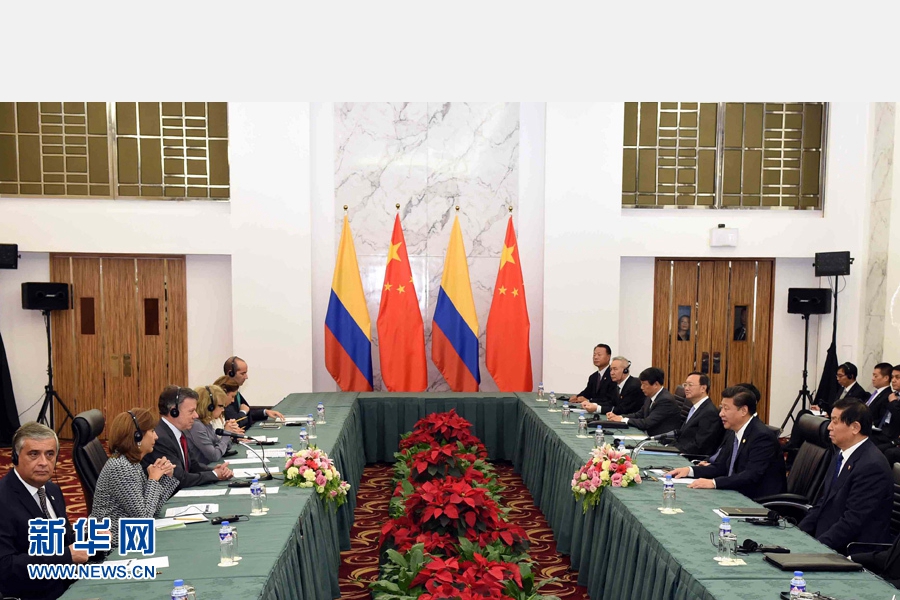 11月18日，國家主席習(xí)近平在菲律賓馬尼拉會見哥倫比亞總統(tǒng)桑托斯。 新華社記者 饒愛民 攝