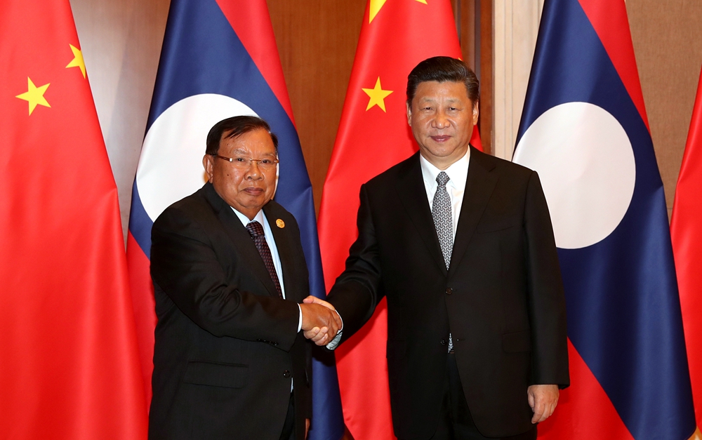 習(xí)近平同老撾人民革命黨中央總書記、國家主席本揚(yáng)舉行會談